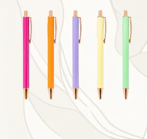 Close-up of five colorful retractable metal ballpoint pens with gold clips and custom logo area