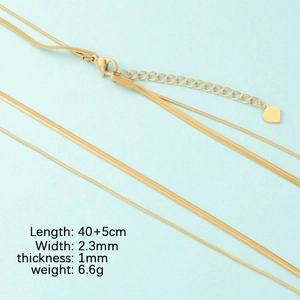 Detailed view of golden double-layer snake chain with heart pendant and size parameters