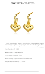 Detailed view of gold heart drop earrings made of S925 silver with 14x25mm dimensions
