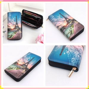 Detailed view of long PU leather wallet with Eiffel Tower print and interior compartments