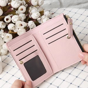 Pink lychee texture leather wallet interior showing multi-card slots and ID window