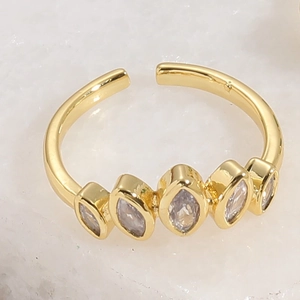Close-up of a 14K gold-plated adjustable ring featuring five marquise-cut zircons