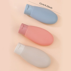 Three-piece 60ml silicone travel squeeze bottles set in blue pink grey 11cm length