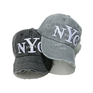 Vintage washed cotton baseball caps with NYC embroidery and distressed rip details