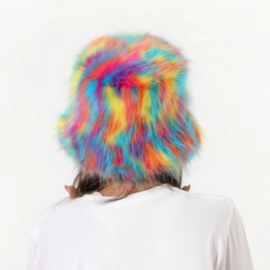 Rear view of model wearing a fluffy rainbow faux fur bucket hat with long plush texture