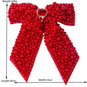 Luxury red pearl bow hair clip with rhinestone center stone measuring 18x15cm
