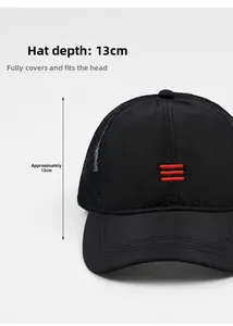 Detail view of breathable black mesh cap with 13cm deep crown and red embroidery