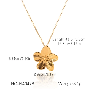 Detail showing 18K gold textured flower pendant necklace dimensions and size measurements