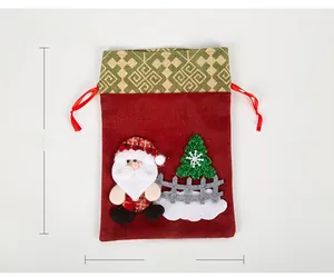 Detail of Christmas drawstring gift bag with Santa Claus applique and dimensions 30x21cm