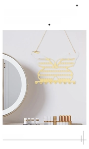 Golden butterfly jewelry organizer with hanging rope for earrings and necklaces