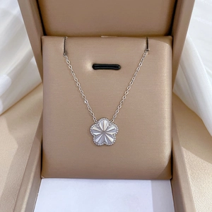 Titanium steel silver flower necklace with textured petal pendant in jewelry gift box