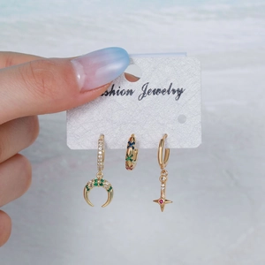 Three-piece gold geometric earring set with colorful zircon star and moon charms