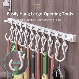 Sliding cabinet rail rack with hooks for kitchen utensils showing 2.5cm opening size