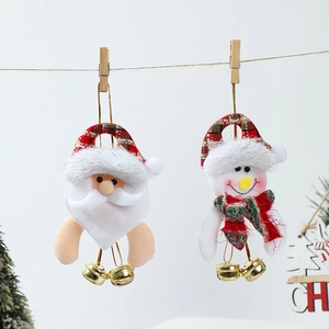 Christmas plush Santa and Snowman ornaments with gold bells hanging on a twine rope
