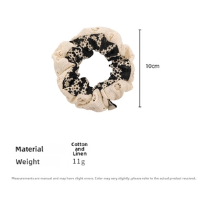 Detail view of cotton linen floral scrunchie with lace overlay, 10cm diameter