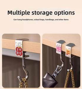 Macro view of adjustable metal desk hook with rabbit pattern and S-shaped bag holder