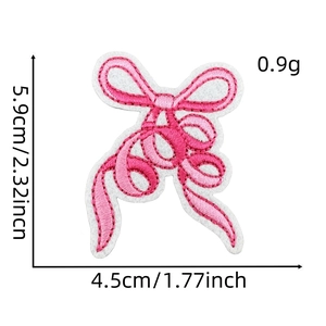 Pink ribbon bow embroidery patch with size measurements 5.9x4.5cm on white background