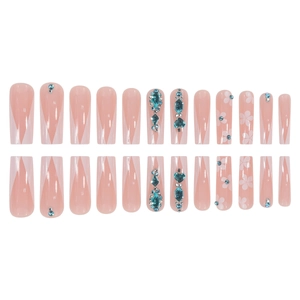 French ballerina press-on nails with nude pink base, white V-tips and turquoise rhinestones