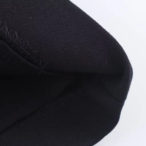 Detailed close-up of high-quality black fabric texture with durable double stitching