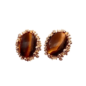 Vintage palace style tiger eye stone oval earrings with gold trim and silver needle stud