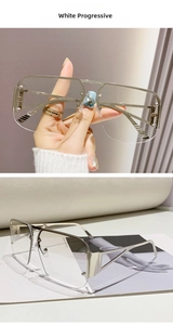Detail of silver half-frame aviator sunglasses with white progressive lenses and cut-out temples