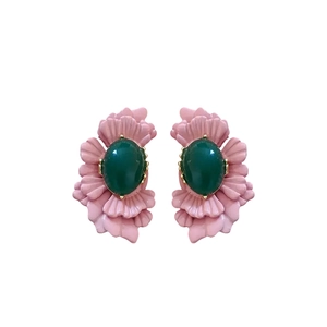 Vintage style floral earrings with pink enamel petals and a green oval gemstone core