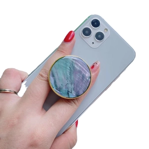 Round cell phone socket with green purple shell texture and gold plated metal frame