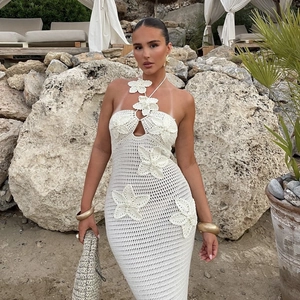 White halter crochet maxi dress with 3D floral details for beach vacation fashion