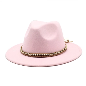 Detail of pink wide brim fedora hat with braided leather band and gold beaded accents