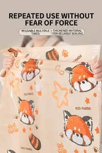 Close-up of durable vacuum storage bag with a cute red panda pattern and air valve.