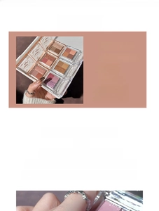 Detail of multi-color mini eyeshadow palette featuring matte and shimmer neutral tones