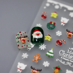 3D embossed Christmas nail stickers featuring Santa, reindeer and snowflakes decorations