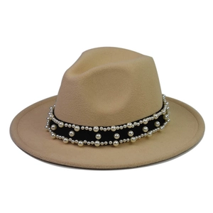 Close-up of beige wool fedora hat with elegant triple-row pearl and belt decoration