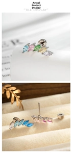 Macro detail of marquise-cut gradient zircon stud earrings with secure screw-back design
