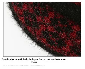 Detail of winter knitted hat brim showing firm structure and red black fuzzy texture