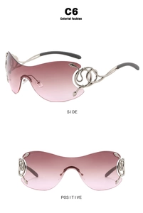 Detail view of pink gradient rimless sunglasses with rhinestone snake metal temples