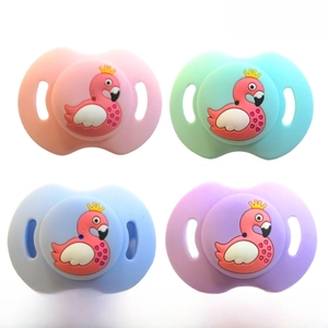 Set of four colorful silicone baby pacifiers with cute crowned flamingo cartoon patterns