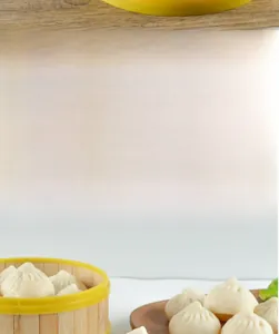 Detailed view of realistic PVC steamed bun model with a mini bamboo steamer on wooden tray