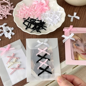 Mix of colorful ribbon bows for DIY craft packing and photocard frame decoration