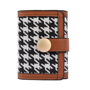 Chic long houndstooth wallet for women with brown leather trim and gold snap closure