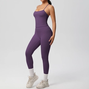 Side view of purple high-waist yoga set featuring a camisole top and leggings