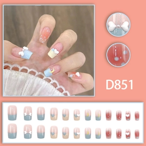 French style press-on nails with heart, bow and moon patterns in blue and pink finish