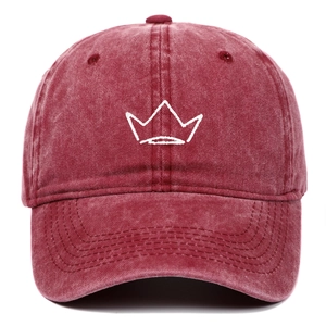 Vintage washed burgundy baseball cap with white embroidered crown logo on plain background