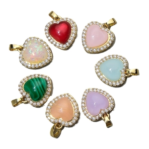 Colorful resin heart pendants with rhinestone border in seven vibrant colors