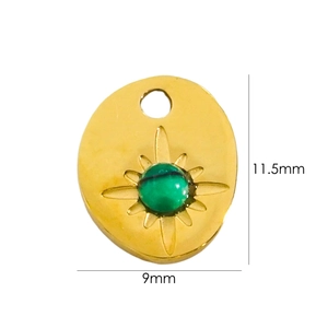 Detail view of 14K gold starburst pendant with green stone inlay and 11.5x9mm dimensions