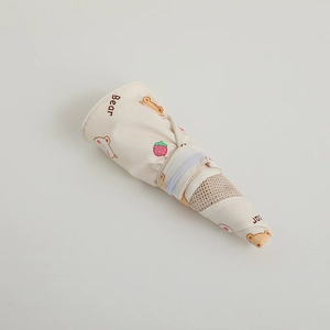 Detail of kids sun visor with breathable mesh, cute bear print and velcro strap