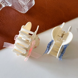Floral bow hair claw clips with acetate material and metal springs for elegant updos
