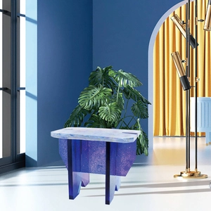 Modern purple acrylic side table with marble top texture and cross-frame base