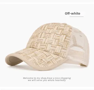 Detail of off-white woven straw front and breathable mesh back on this summer baseball cap