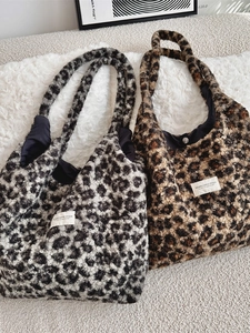 Chic faux shearling leopard print tote bag with magnetic closure and soft curly plush texture
